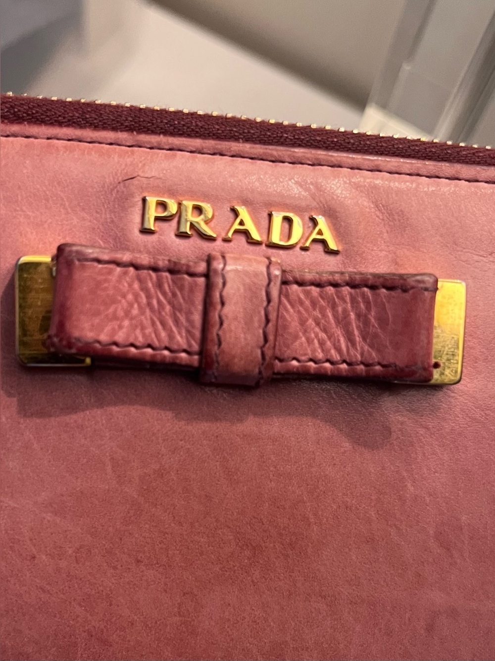 Prada wallet pre loved a lot of life left perfect outside wear on outside leathe